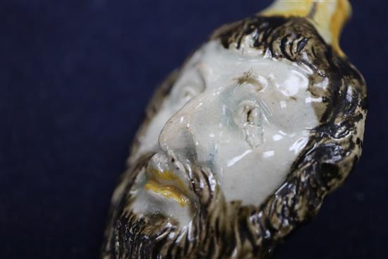 An 18th century Prattware mask scent bottle length 8cm